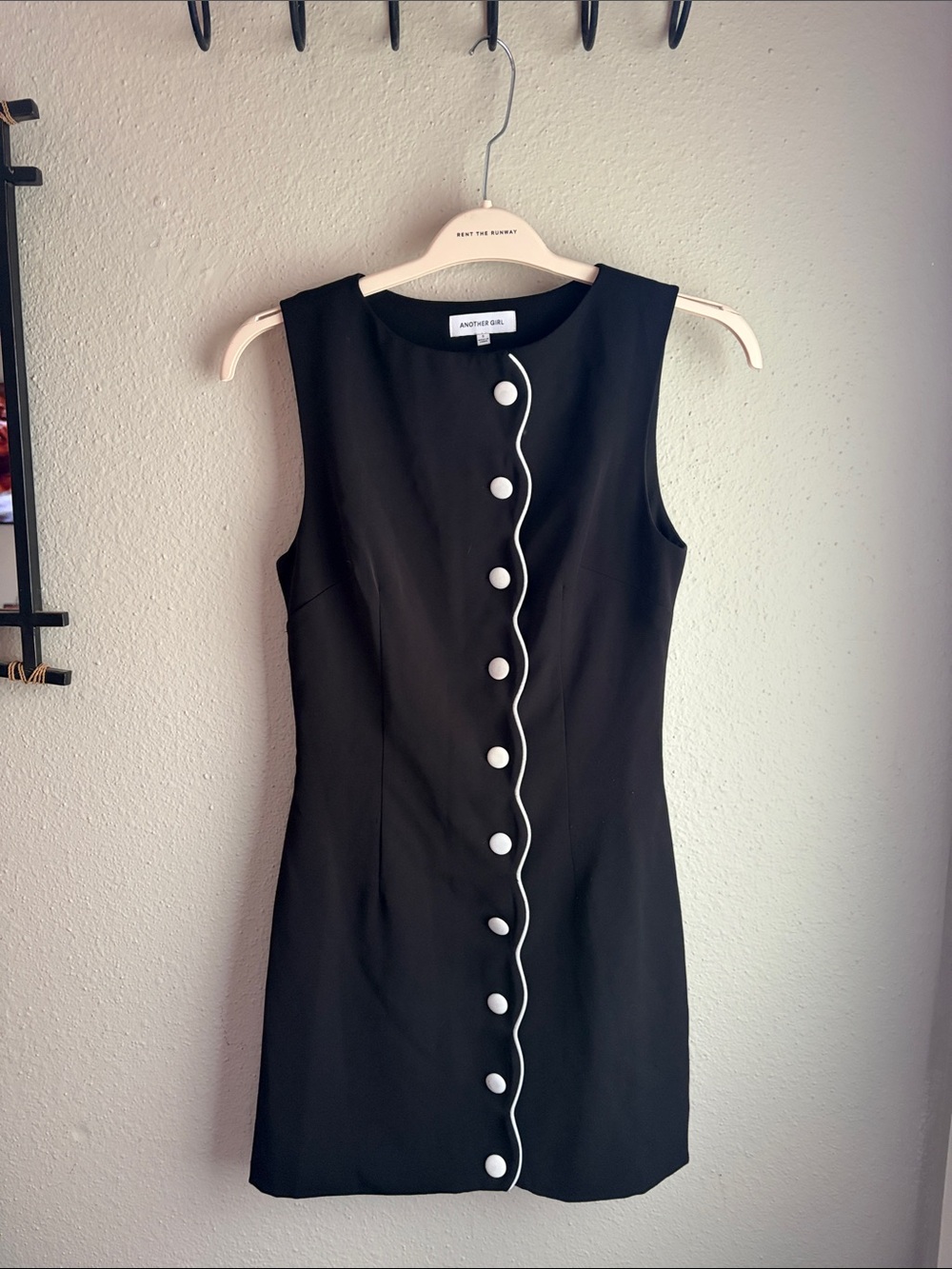Andover Girl Black Sleeveless Mini Dress with White Button Trim